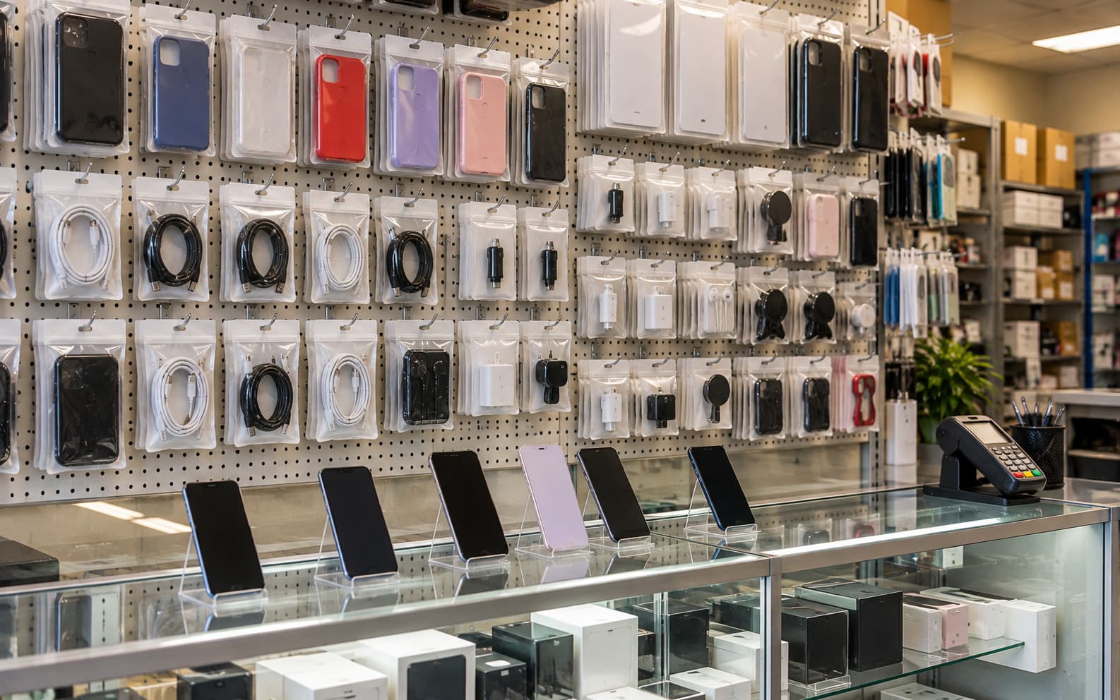 The prepaid phone display wall, with cases, cables and handsets